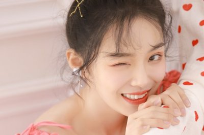 猜谜语题目:田里雨后长青草《打一个字》